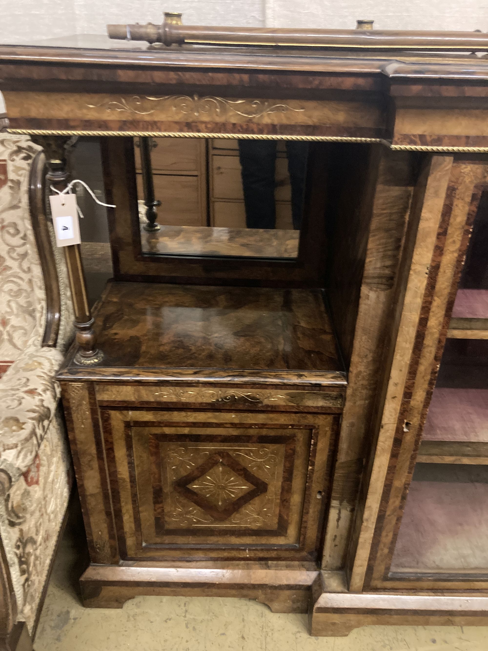 A late Victorian figured walnut breakfront side cabinet, width 168cm depth 43cm height 104cm